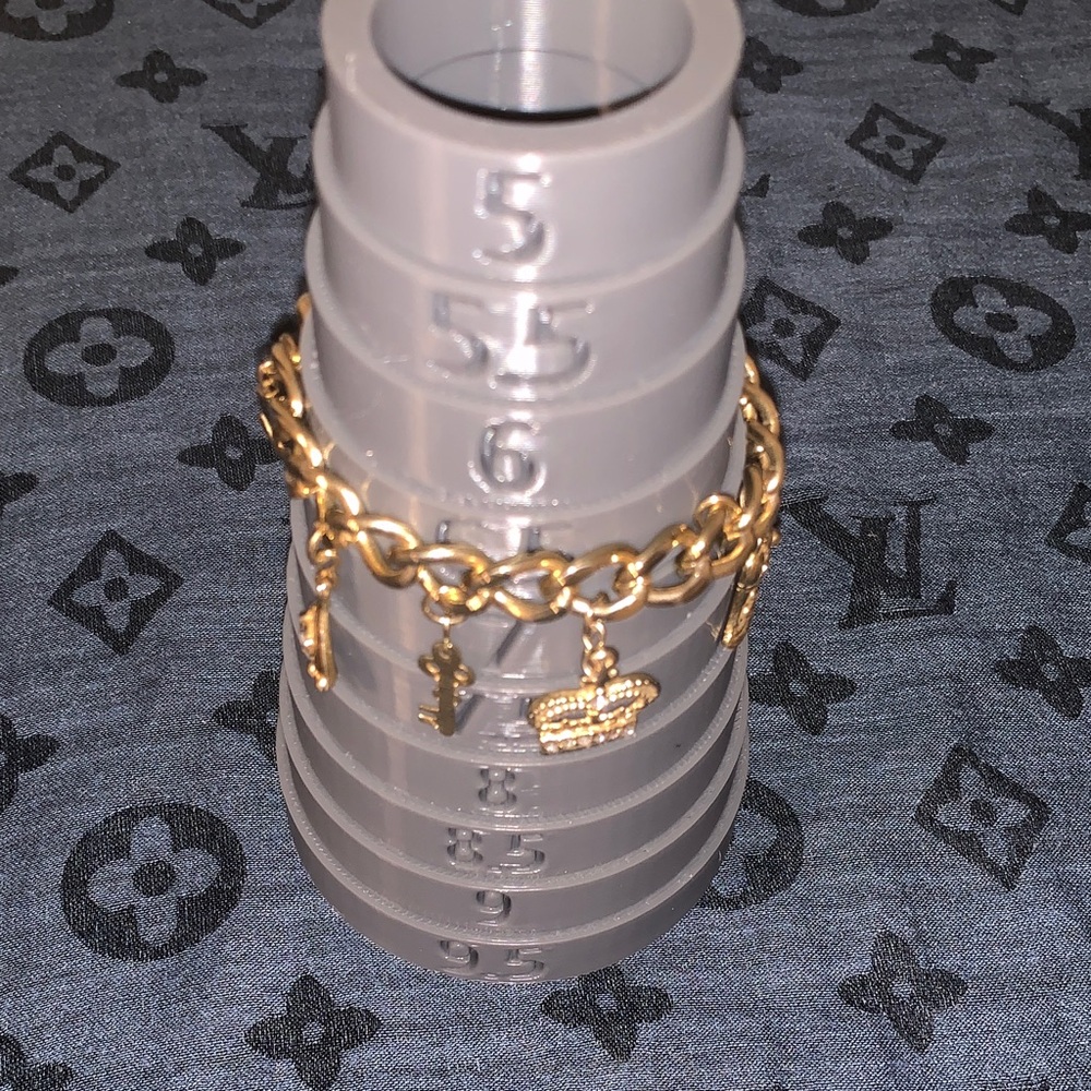 Two Gold Tone Bracelets